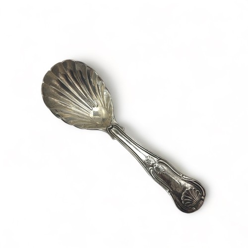 110 - A George III  silver caddy spoon with marks for William Eley I & William Fearn, London 1821.