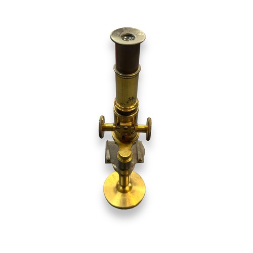 162 - Early 20th Century brass microscope, unmarked. Height 28.5cm.