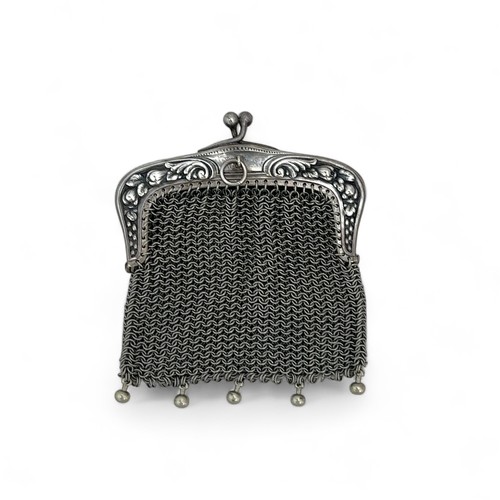 100 - A white metal mesh purse, weight 56g.