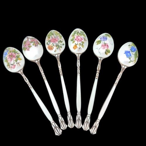 92 - A set of silver and enamel coffee spoons by Henry Clifford Davis, 1957. The obverse of each spoon is... 