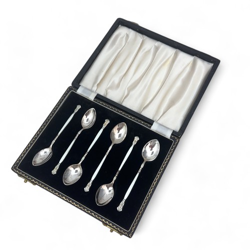 92 - A set of silver and enamel coffee spoons by Henry Clifford Davis, 1957. The obverse of each spoon is... 