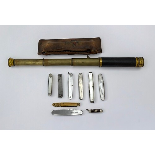 69 - An unmarked three drawer brass telescope in leather case offered together with a collection of white... 