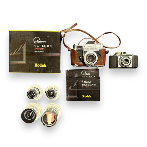 150 - Kodak Retina Reflex III Camera & Lenses. A Retina Reflex III camera with original box and manuals. I... 