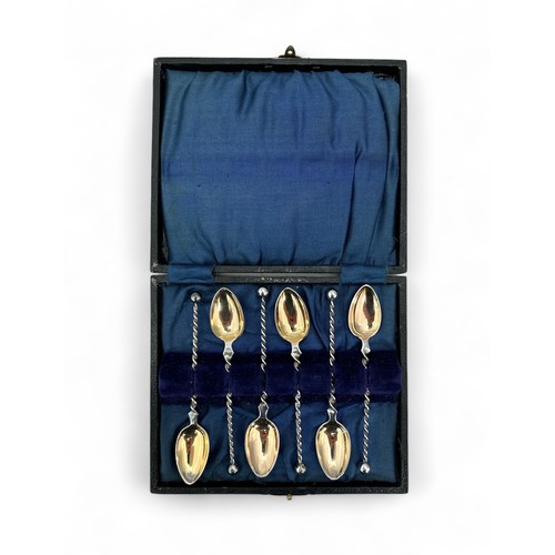 102 - A set of six white metal coffee spoons stamped as 830 silver in a fitted case.