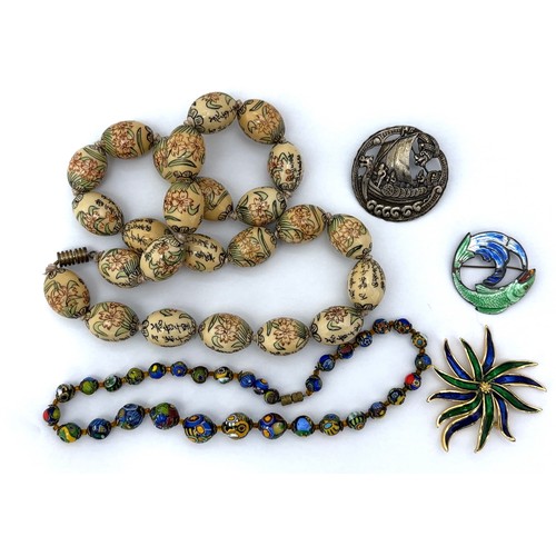 21 - Silver and costume jewellery - includes a Chinese porcelain painted bead necklace, a millefiori bead... 