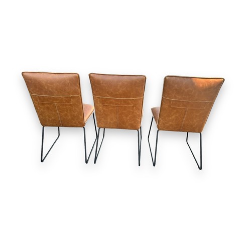 473 - Cleo Faux Leather industrial dining chairs set of three in tan. Stitched backs, matte metal legs, so... 