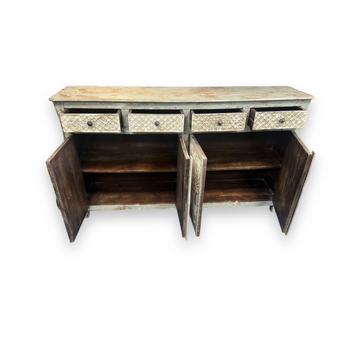 465 - Large whitewash contemporary unburst mango wood sideboard. Four drawers, four cupboards, carved. Hig... 