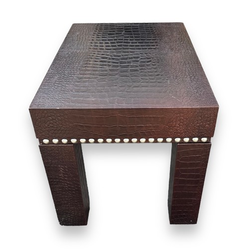 475 - Contemporary faux crocodile skin coffee table with studded surround design. Height 50cm, length 75cm... 