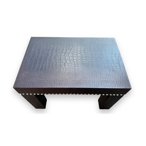 475 - Contemporary faux crocodile skin coffee table with studded surround design. Height 50cm, length 75cm... 