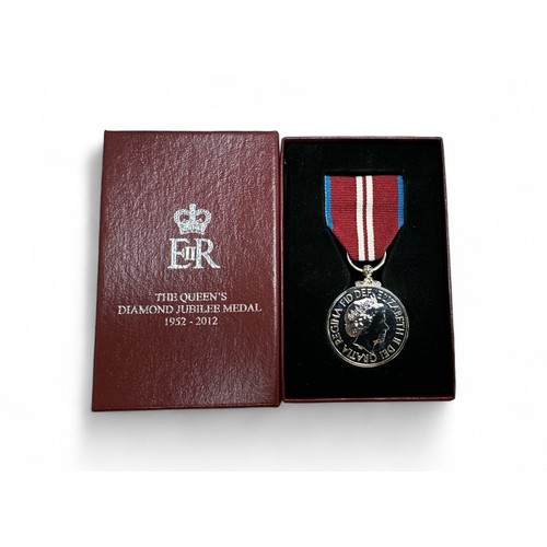 39 - Queen Elizabeth II – The Queen’s Diamond Jubilee Medal 1952-2012, boxed.