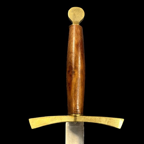 90 - Excalibur Style Sword. Wooden handle with brass guards. Length of Sword 108cm.