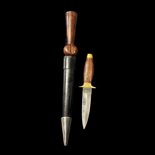 92 - Dagger with Sheath and Pocket Knife. Dagger has wooden handle, approx 17.5cm blade length. With Blac... 