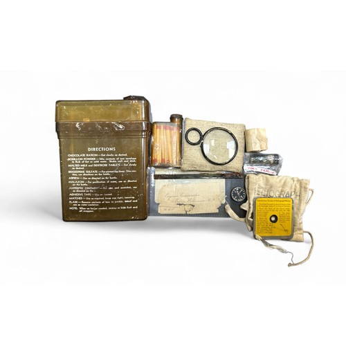 119 - Second World War Survival Kit in original box, containing lens in case, compass, Heliograph Mirror, ... 