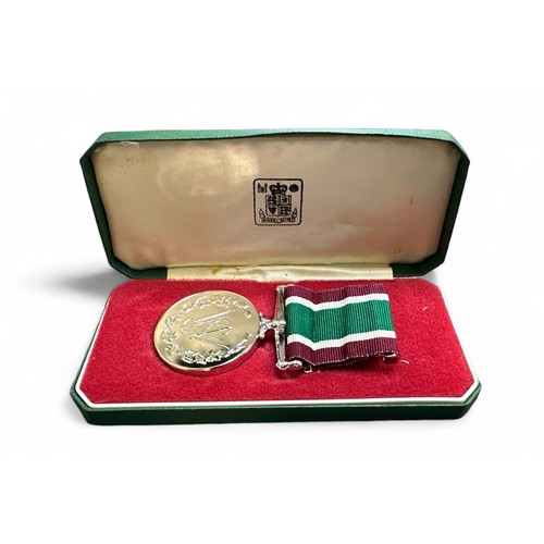 37 - Women’s Voluntary Service Medal, cased with ribbon.