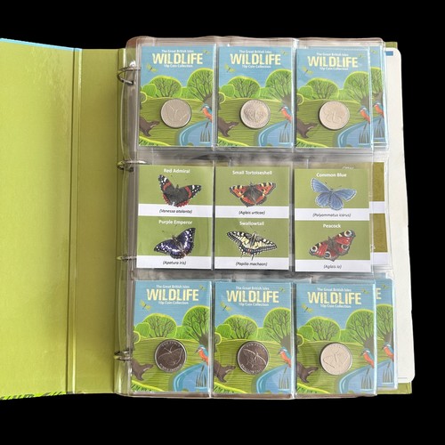 365 - Guernsey 2022 Wildlife 10p coins on card (48), plus 50p shaped bird medallions (10), in a Westminste... 