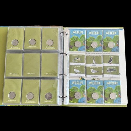 365 - Guernsey 2022 Wildlife 10p coins on card (48), plus 50p shaped bird medallions (10), in a Westminste... 