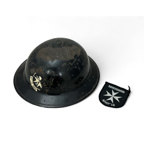 114 - Second World War Civil Defence Steel Brodie helmet with black lacquer and The St. John Warwickshire ... 