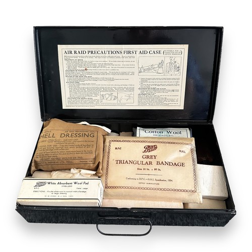 112 - Second World War / WWII ARP Wardens First Aid Case by Boots Pure Drug Co Ltd, containing a quantity ... 