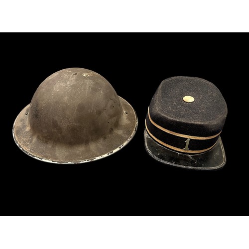 110 - Second World War / WWII Brodie Helmet, marked for 1943, with internals and chin strap. Plus a boys b... 