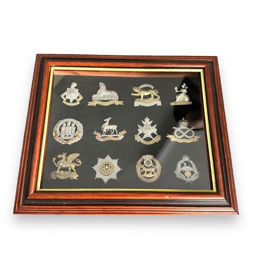 58 - Cap Badges, collection of cap badges in six display frames, to include; Lancashire Hussars, Royal Co... 