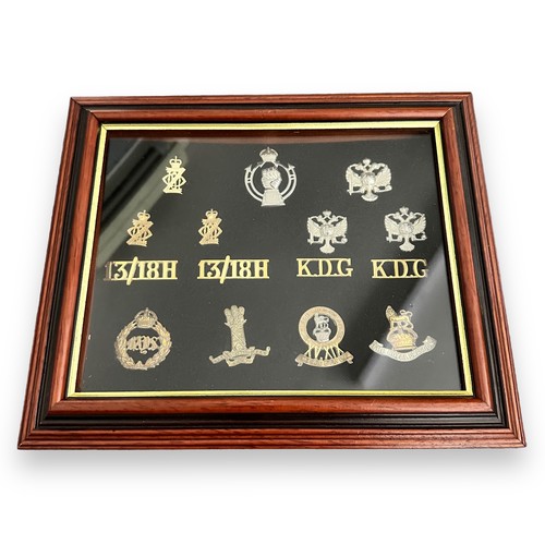 58 - Cap Badges, collection of cap badges in six display frames, to include; Lancashire Hussars, Royal Co... 