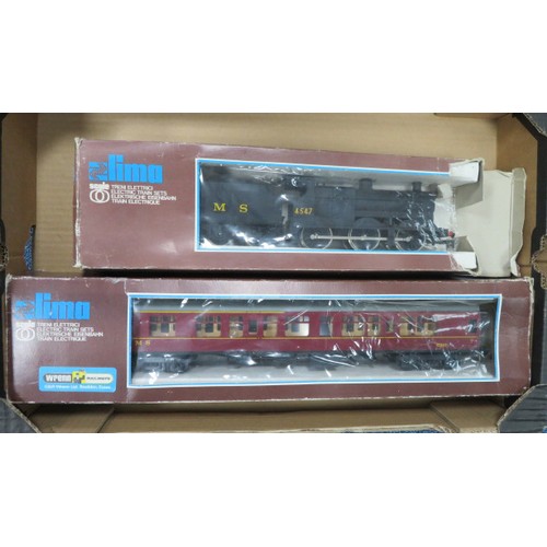 26 - Lima O gauge LMS black 4547 0-6-0 locomotive No. 6533 and LMS maroon coach 15864 No. 6616, generally... 