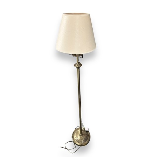 464 - Two 20th Century Metal Floor Lamps. Swing arm floor standing standard lamps. The lamps each raised o... 