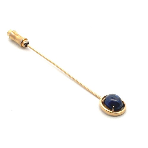 10 - A sapphire cabochon pin set in unmarked gold, mount tested using XRF as 15ct gold. Sapphire 8mm x mm... 