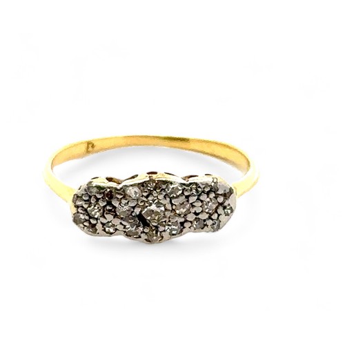 53 - A vintage diamond ring with small diamonds set in a white metal facing yellow gold mount, size M.  G... 