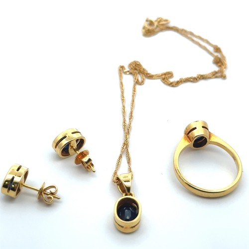 39 - A sapphire and 18ct gold necklace, earrings and ring set. Pendant set with sapphire 8mm x 6mm, stamp... 