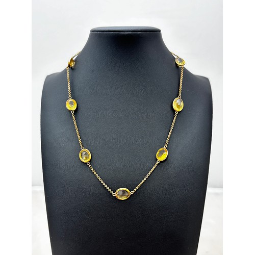 6 - A citrine necklace on an umarked yellow metal 16