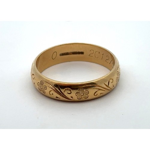 1 - An 18ct yellow gold ring with engraved foliate decoration, size O Size Hallmarks for CG & S, Birming... 