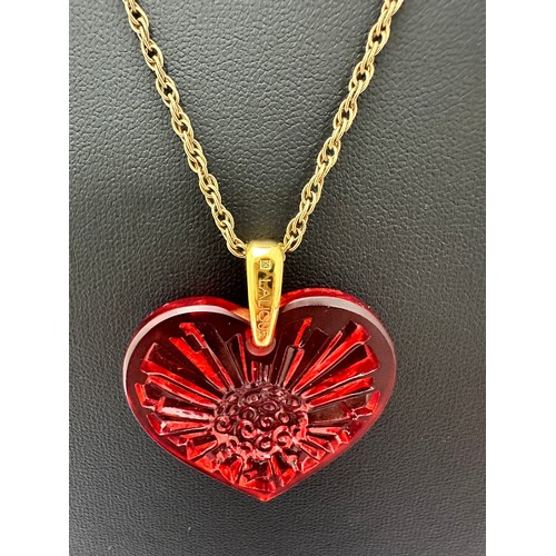 7 - A boxed Lalique red heart glass pendant on a 17