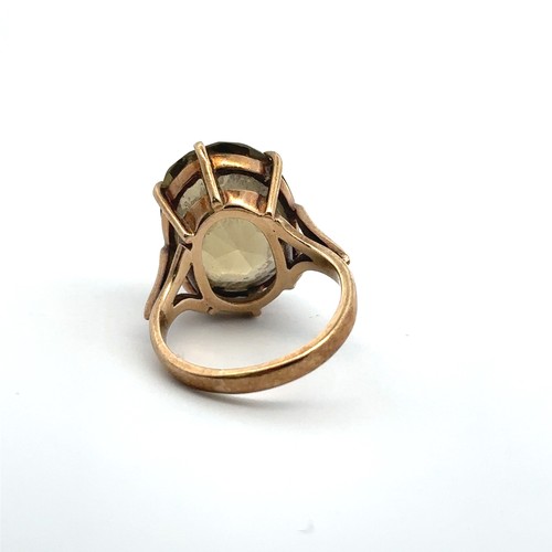 68 - A prasiolite quartz 9ct gold ring, size J.  Quartz approx 18 x 12mm with minor nibbles on facet edge... 