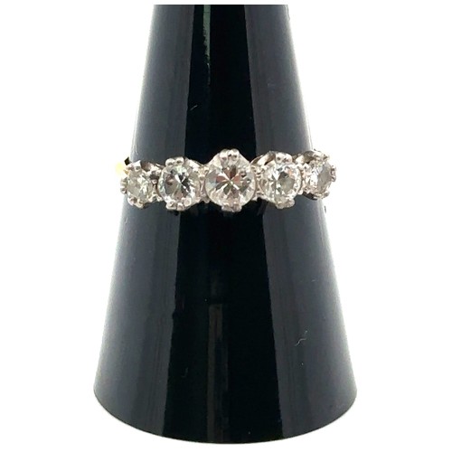 14 - A five stone diamond ring, size O/P. Diamonds round brilliant cut.  Total diamond weight approx 0.9c... 