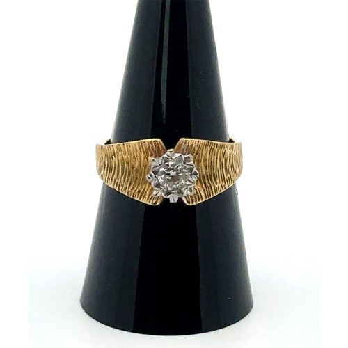 36 - An 18ct illusion set diamond ring with bark effect shank. Size P. Diamond approx 0.25ct. Weight 5.4g... 