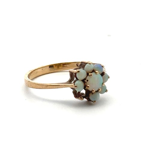 59 - Two 9ct gold and opal rings, an opal cluster ring missing an opal size P/Q, and a single stone opal ... 