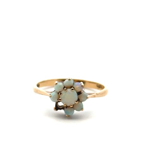 59 - Two 9ct gold and opal rings, an opal cluster ring missing an opal size P/Q, and a single stone opal ... 