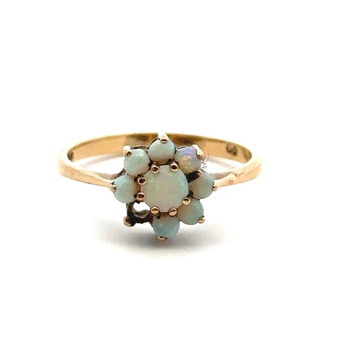 59 - Two 9ct gold and opal rings, an opal cluster ring missing an opal size P/Q, and a single stone opal ... 