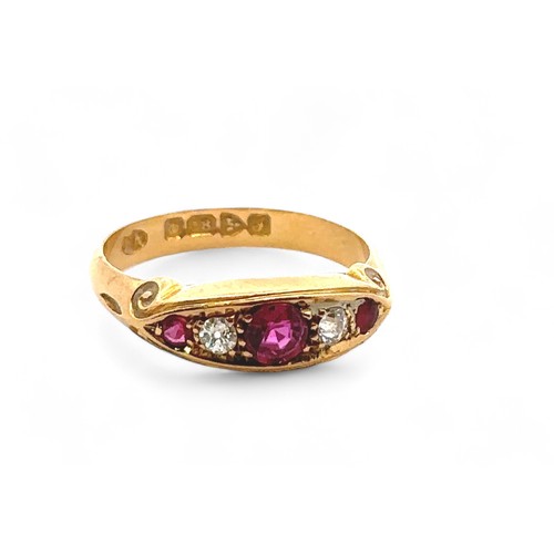 47 - An 18ct yellow gold ruby and diamond gypsy ring, size L/M. 1909 Chester hallmarks. Small chip to gir... 