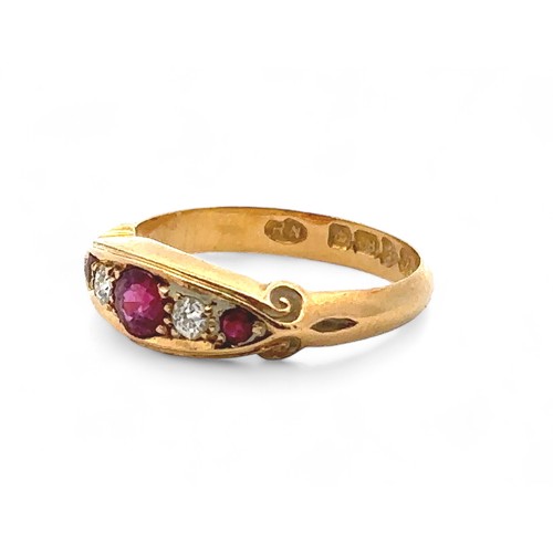 47 - An 18ct yellow gold ruby and diamond gypsy ring, size L/M. 1909 Chester hallmarks. Small chip to gir... 