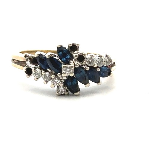 48 - Two hallmarked 9ct gold rings. A sapphire and diamond ring, size L, missing 3 diamonds and a blue st... 