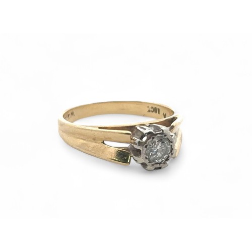 19 - An illusion set diamond ring stamped 18ct, size M. Diamond approx 0.23ct. Inscribed to inner shank '... 