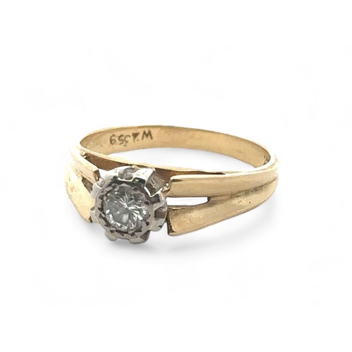 19 - An illusion set diamond ring stamped 18ct, size M. Diamond approx 0.23ct. Inscribed to inner shank '... 