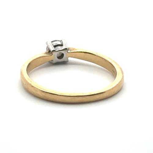 60 - A 0.2ct diamond solitaire ring set in hallmarked 18ct yellow gold, size J. Sponsor E.F. Weight 2.2g.