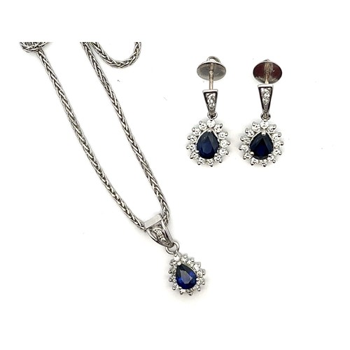 30 - A sapphire and diamond necklace and earrings set. The necklace with a central pear shaped sapphire s... 