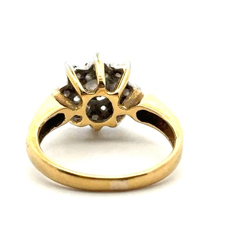 31 - An 18ct yellow gold and diamond flower ring, size I. Central diamond of approx 0.2ct is illusion set... 