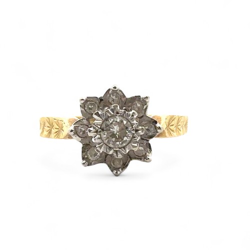 31 - An 18ct yellow gold and diamond flower ring, size I. Central diamond of approx 0.2ct is illusion set... 