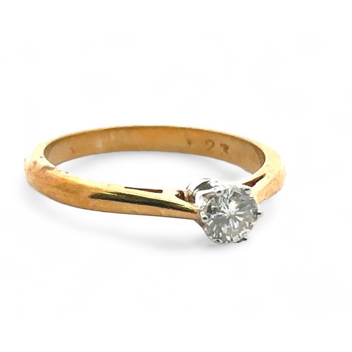 61 - An 18ct gold solitaire diamond ring, size K. Diamond approx 0.23ct and inscribed 23 in inner shank. ... 