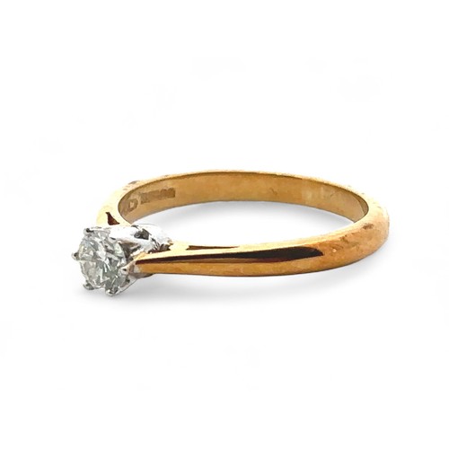 61 - An 18ct gold solitaire diamond ring, size K. Diamond approx 0.23ct and inscribed 23 in inner shank. ... 